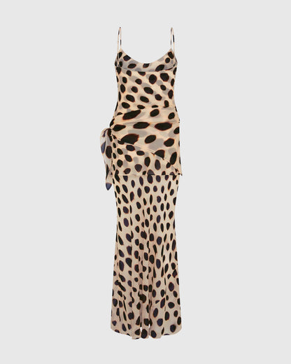 Spot Tie-Waist Slip Maxi Dress. Chic sarong-style hip tie, and a bold oversized animal print—perfect for island nights and glamorous sunset dinners.